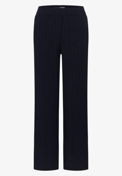 Dunkelblaue, gerade geschnittene Stretch-Strickhose mit feinen Rippen.