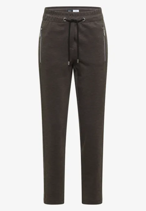 Pantalon taille mi-haute, coupe Slim Leg et style décontracté creamy mocha Dunkelbraune Jogginghose mit Tunnelzug und Reißverschlusstaschen.