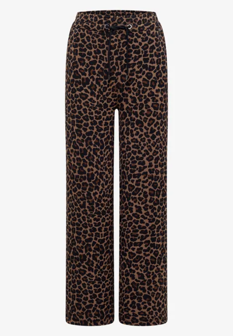 Pantalon ample élégant à motif léopard marron et noir.