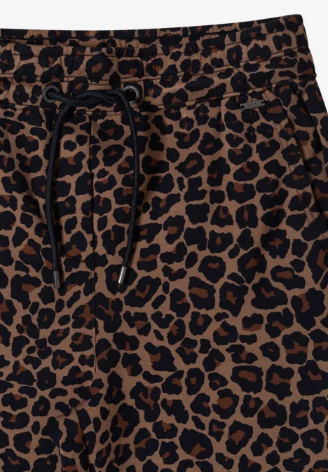 Jogging marron à motif léopard noir avec cordon de serrage.
