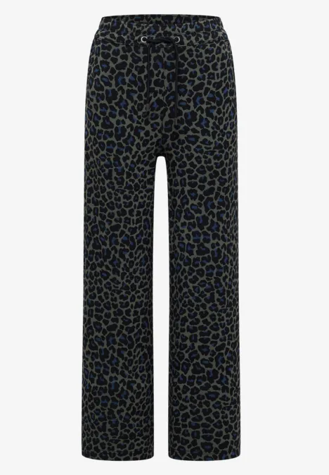 Pantalon noir ample à motif léopard doré