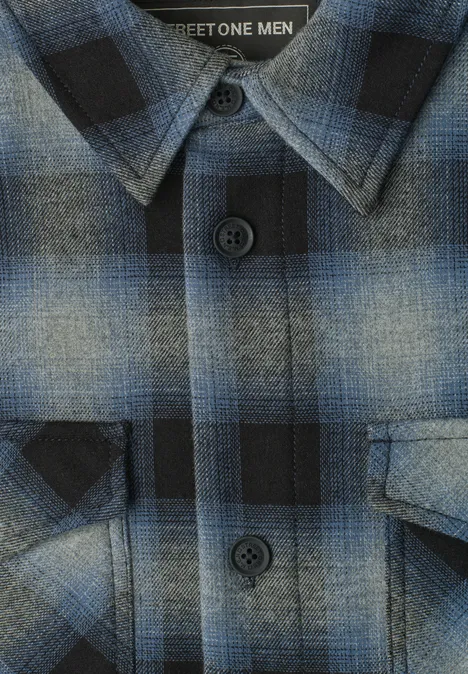 Chemise en flanelle à carreaux bleu et noir, col et poches poitrine