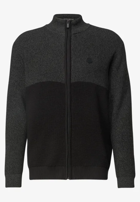 Dunkelgraue, zweifarbige Strickjacke mit durchgehendem Reißverschluss und Stehkragen.