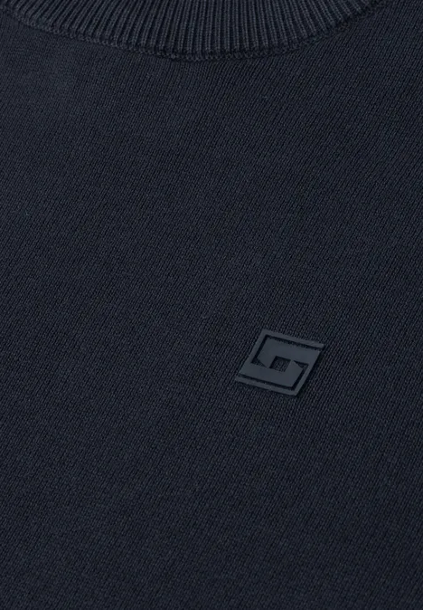 Eenvoudige trui met ronde hals in effen kleur dark basic blue Donkerblauwe trui met klein vierkant zwart logo op de borst.