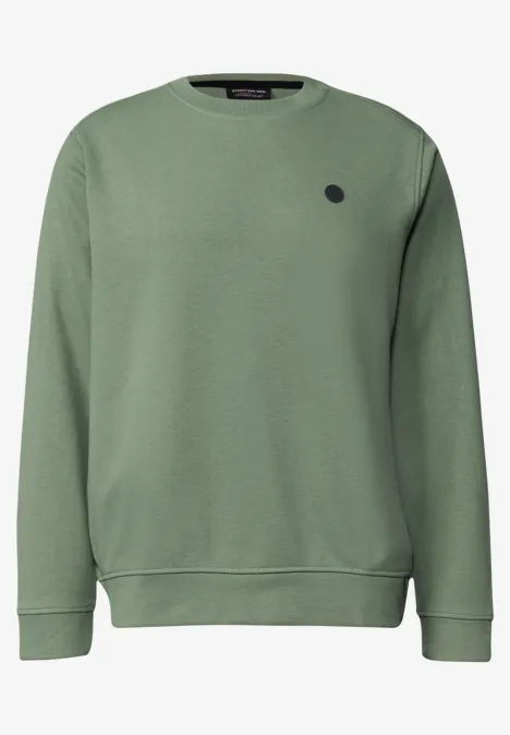 Grüner Sweatshirt mit rundem Logo auf der Brust.
