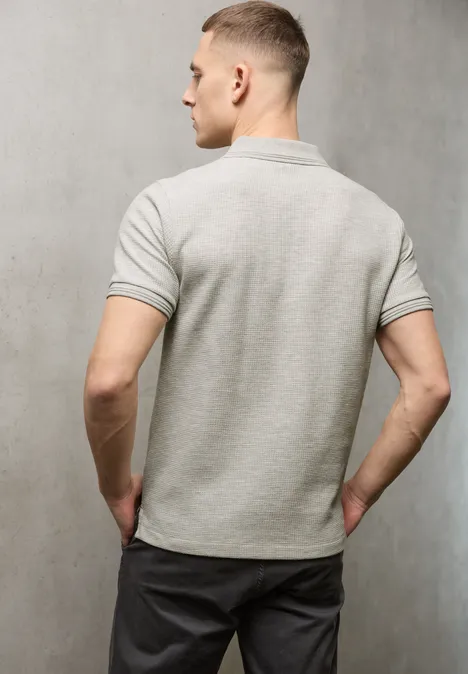 Poloshirt in effen kleur white sand