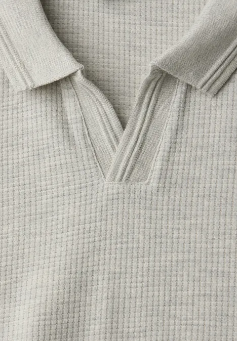 Poloshirt in effen kleur white sand