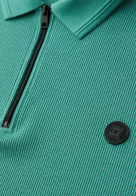 Polo zippé et structuré caribbean green