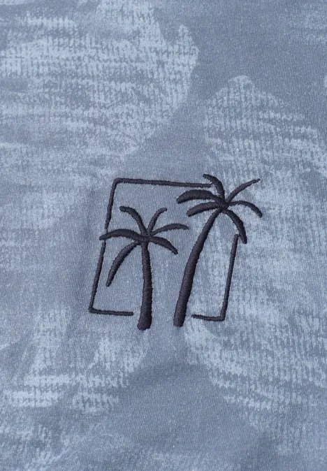 Twee gestileerde palmbomen als zwarte borduursel op grijs, gestructureerd textiel