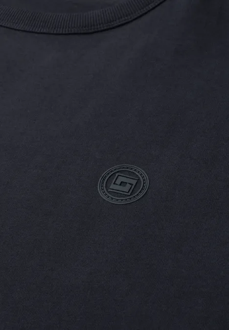 Langarm Shirt mit Rundhals in Unifarbe dark ink blue Schwarzes T-Shirt mit schlichtem, rundem Logoaufdruck auf der Brust.