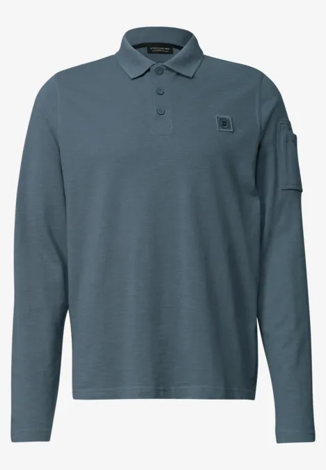 Poloshirt met lange mouwen en zakdetail vintage blue Langarm-Polo in blauwgrijs met logo-patch op borst en zak op mouw.