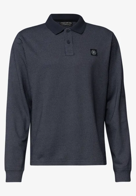 Dunkelblaues Langarm-Polohemd mit Baumwollpiqué, klassischem Kragen, Knopfleiste und kleinem Brustlogo.