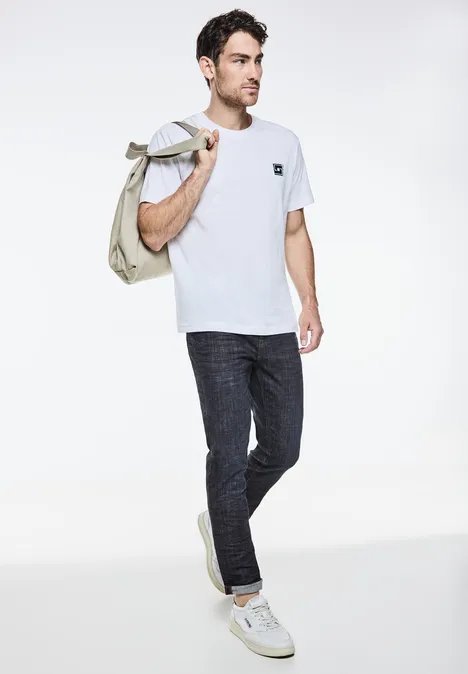 Jeans à la coupe régulière dark blue rinsed wash