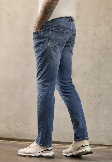 Jeansy z nogawką Slim Leg o kroju Regular Fit indigo blue random wash Jeansy z nogawką Slim Leg o kroju Regular Fit indigo blue random wash