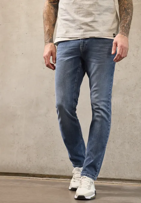 Jeansy z nogawką Slim Leg o kroju Regular Fit indigo blue random wash Jeansy z nogawką Slim Leg o kroju Regular Fit indigo blue random wash