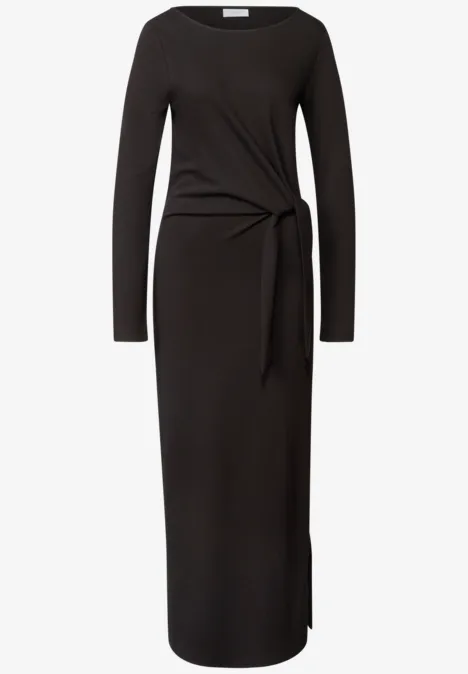 Midikleid aus Jersey mit Knotendetail charred brown Schwarzes, langärmeliges Midikleid mit seitlichem Knotendetail und figurbetonter Passform.