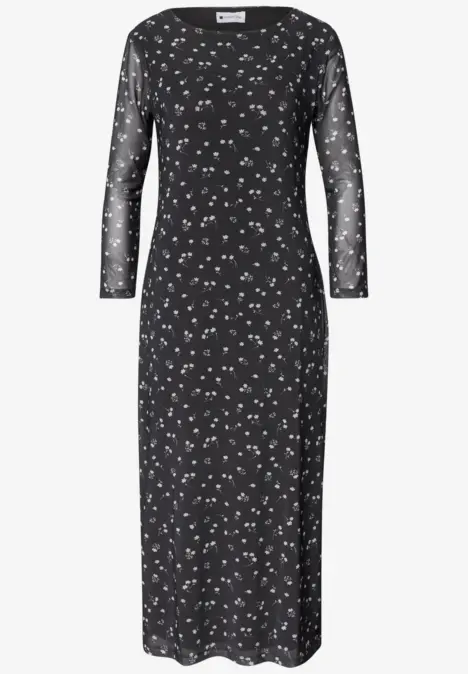 Schwarzes, eng anliegendes Midi-Kleid mit transparenten Ärmeln und kleinem weißen Blumenmuster.