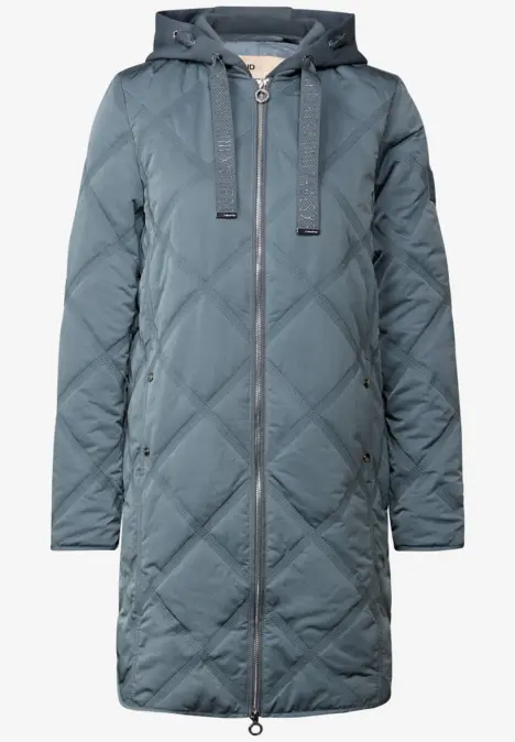 Lange, gewatteerde damesjas in blauw met capuchon en rits.