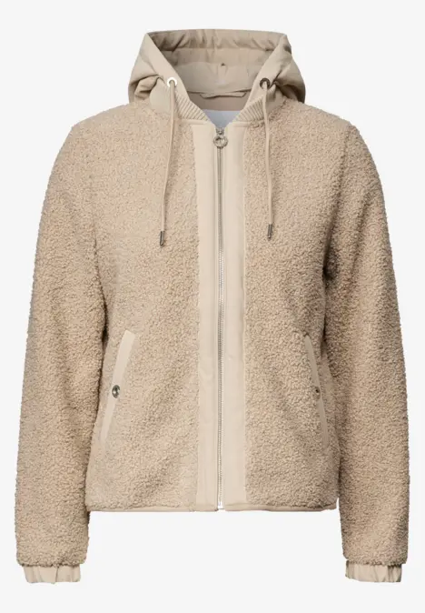 Beige teddyfleece-jas met capuchon, rits en steekzakken.