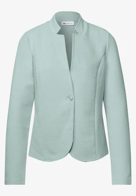 Veste femme vert menthe à un bouton, coupe ajustée et manches longues.