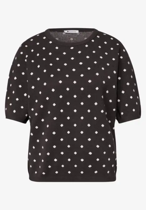 Schwarzes T-Shirt mit weißen Punkten
