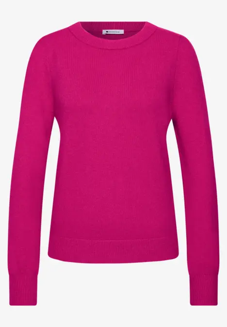 Ein schlichter, pinkfarbener Damenpullover mit Rundhalsausschnitt und langen Ärmeln.