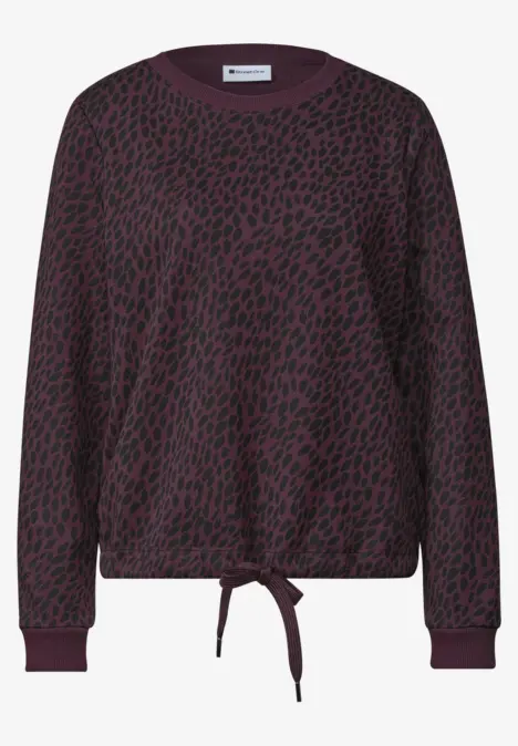 Pull décontracté à manches longues violet foncé avec imprimé léopard noir et lien de serrage à la taille.