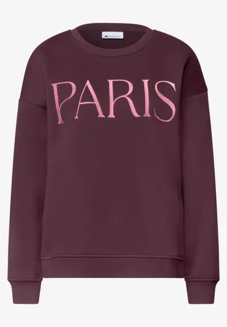 Sweat-shirt bordeaux avec inscription rose 'PARIS' sur la poitrine.