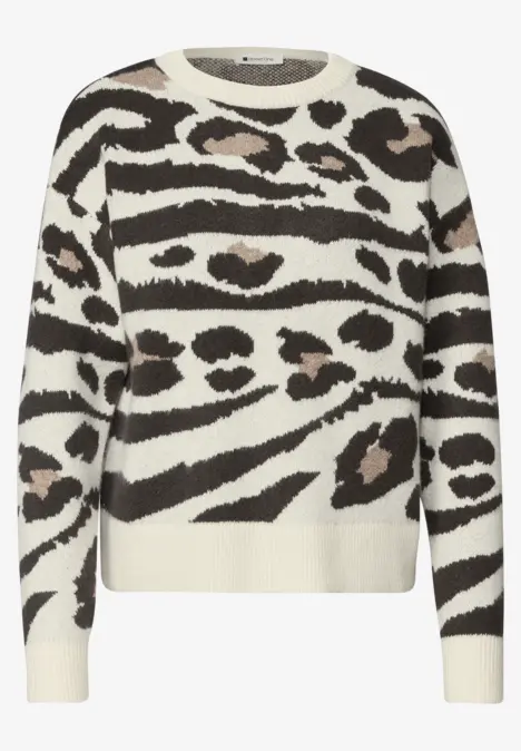 Ecru trui met zwarte en bruine dierenprint in een gestreept design.