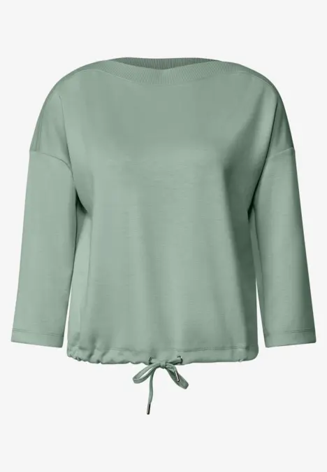 Groene blouse met driekwartmouwen en aantrekkoord onderaan