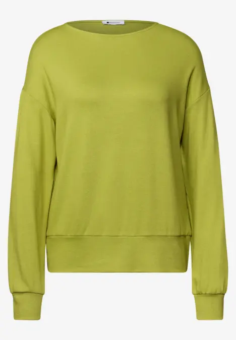 Ein schlichtes, langärmeliges Sweatshirt in leuchtendem Grün mit Rundhalsausschnitt.