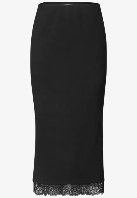Jupe crayon noire mi-longue avec ourlet en dentelle.