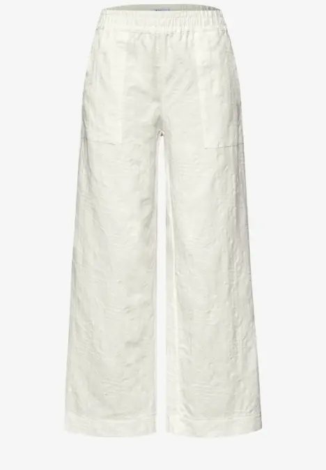 Weiße, weit geschnittene Hose mit elastischem Bund und geradem Bein.
