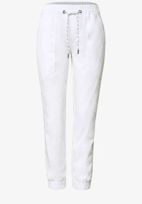 Weiße Leinen-Jogginghose mit Kordelzug, seitlichen Taschen und elastischen Bündchen.
