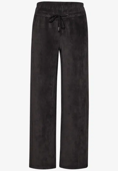 Zwarte, losse corduroy broek met elastische taille en aantrekkoord.