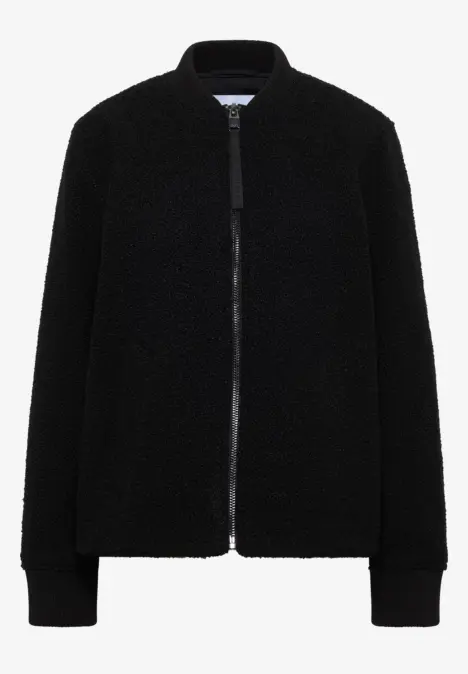 Schwarze, flauschige Jacke mit Reißverschluss, Stehkragen und Rippbündchen.