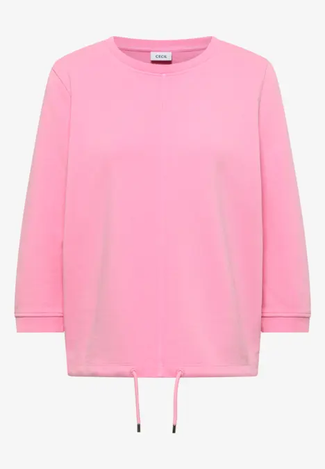 Locker geschnittener, rosa Pullover mit langen Ärmeln und Kordelzug am Saum.