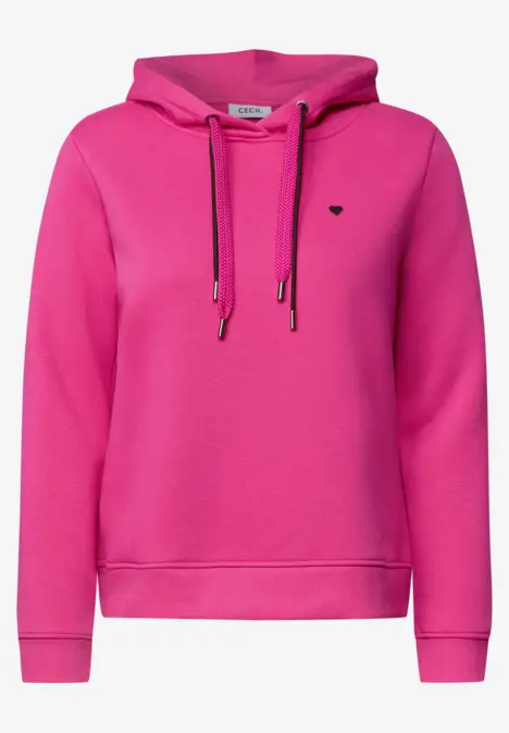 Pinkfarbener Kapuzenpullover mit Kordelzug und kleiner Logo-Applikation auf der Brust.