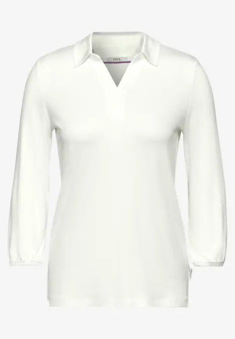 Weiße Bluse mit Kragen und langen Ärmeln.