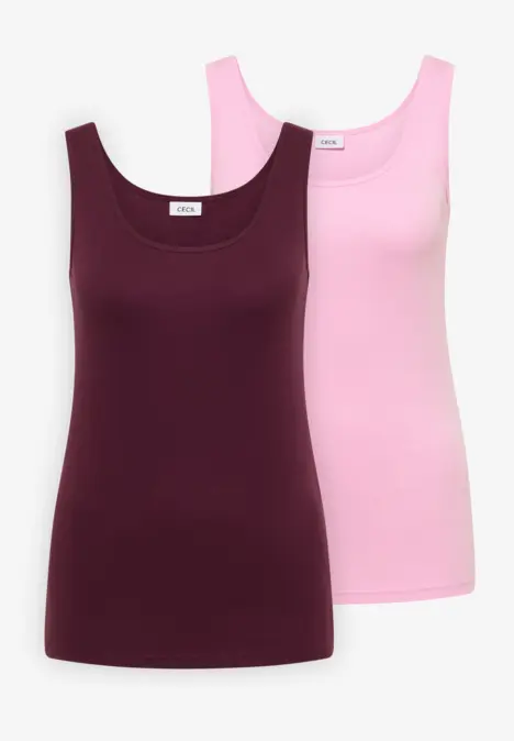 Zweiteiliges Set aus ärmellosen Tops in Burgund und Rosa.