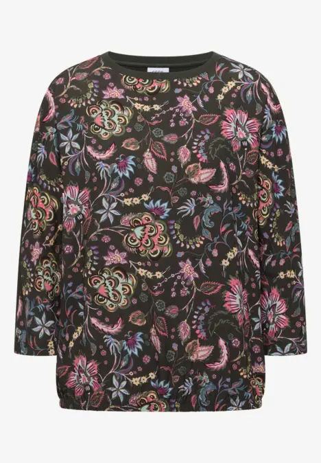 Pull noir orné de motifs fleuris stylisés multicolores et manches longues.