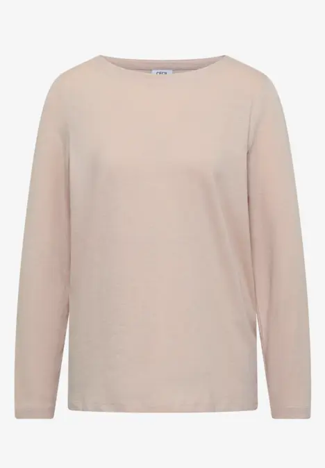 Ein schlichtes, hellbeiges Langarmshirt ohne Muster.