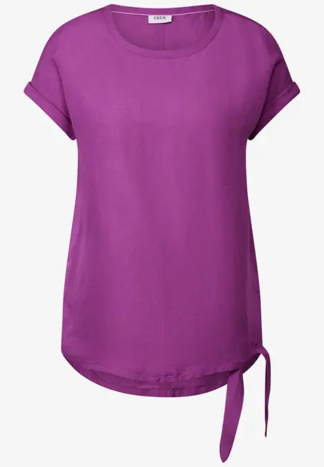 Paars T-shirt met korte mouwen en strik aan de zijkant.
