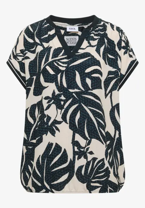 Chemisier blanc et bleu à col V, motif feuilles tropicales pour femmes.