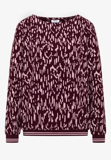 Bordeauxroter Pullover mit rosa abstraktem Strichmuster, langärmelig, Rundhalsausschnitt und gerippten Bündchen.