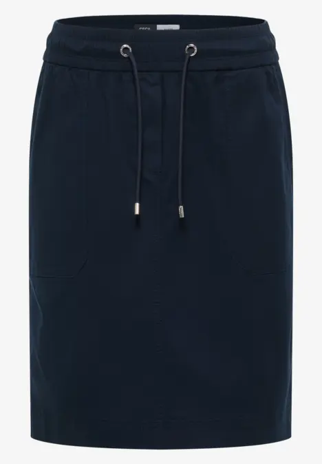 Dunkelblauer knielanger Rock aus Jersey mit elastischem Bund, Tunnelzug und Eingrifftaschen.