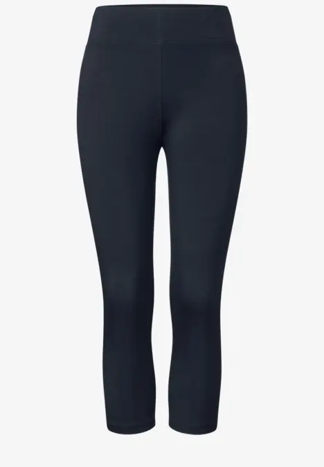 Dunkle, knöchellange Leggings mit hohem Bund.