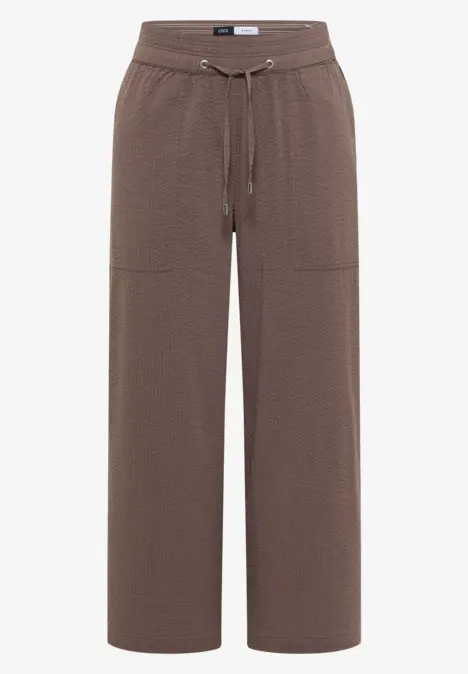Braune, weite Damenhose mit Gummibund, Tunnelzug und aufgesetzten Taschen