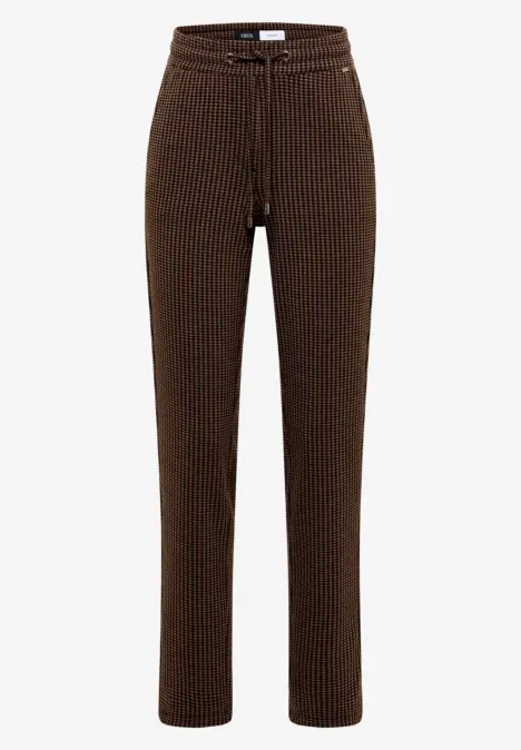 Braune, gerippte Strickhose mit geradem Bein sowie Reißverschluss- und Knopfverschluss.
