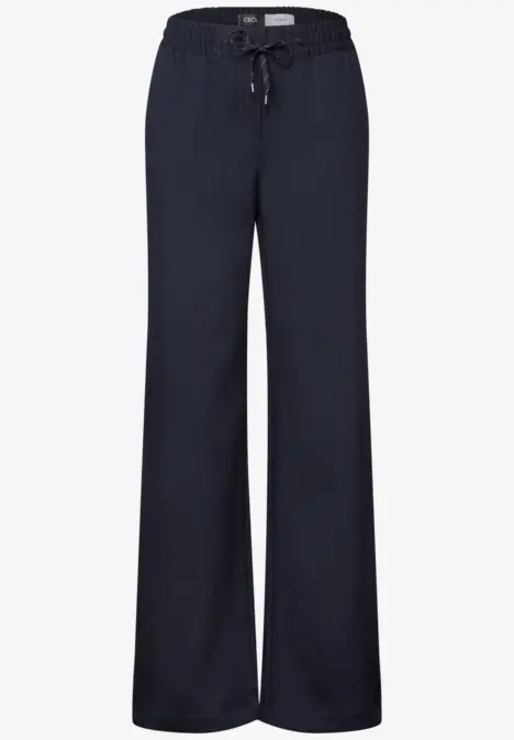 Donkerblauwe, wijdvallende sweatbroek met elastische taille en trekkoord.